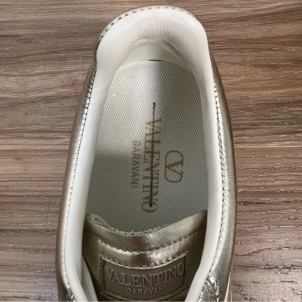 Valentino Garavani Women’s Upvillage Trainer Sneakers in Laminated Calfskin Gold
